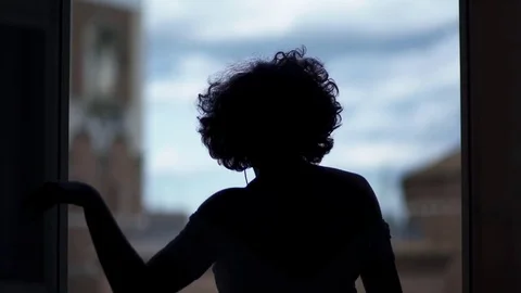 Dancer silhouette dancing in front of the window Stock Footage 72941888
