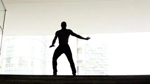 Dancer silhouette performing in the city Stock Footage 57272160