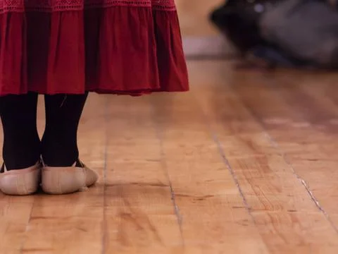 A dancer standing in a dance school room attending a lesson Stock Photos