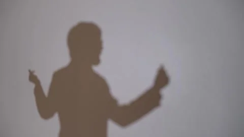 Dancer in the studio. The shadow of a young guy in the image of the 17th century Stock Footage 245454459