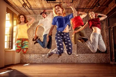 Dancer team - dancer people jumping during music Stock Photos