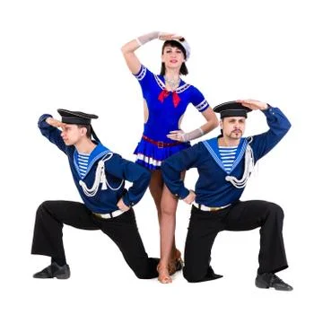 Dancer team dressed as a sailors posing on an isolated white background Stock Photos
