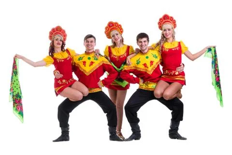 Dancer team wearing a folk costumes isolated on white Stock Photos
