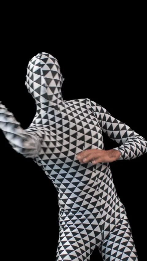 Dancer in a triangular pattern body suit in vertical Stock Footage 264749059