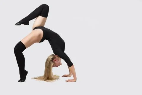The Dancer on a White Background Doing Workout Stock Photos