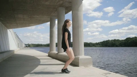 Dancer woman outdoors shaking head in slow motion Stock Footage