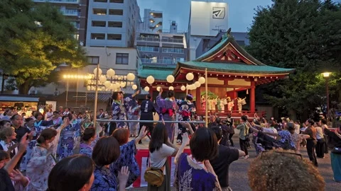 Dancers Circle Stage Beneath Shrine and City Skyline, Asakusa Stock Footage 344005701