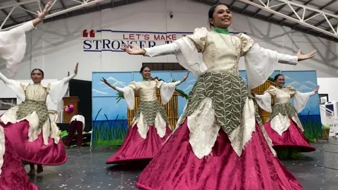 Dancers in costumes perform their practiced dance steps Stock Footage 335525452