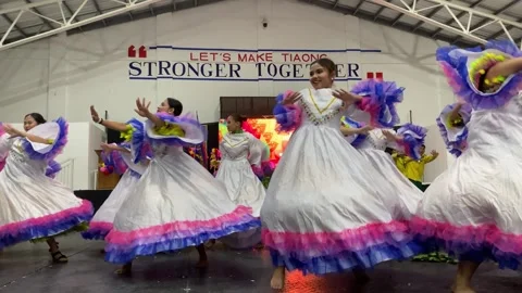 Dancers in costumes perform their practiced dance steps Stock Footage 335525553