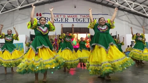 Dancers in costumes perform their practiced dance steps Stock Footage 335525704
