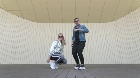 Dancers dancing street break dance on an open stage. Slow motion. Low shoot poin Stock Footage 132660435