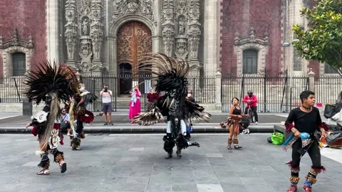 Dancers dressed as Aztecs perform in downtown Mexico City, Mexico 4K Stock Footage 162273513