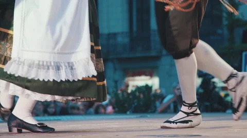 Dancers in espadrilles dancing to a traditional Catalan song in Barcelona Stock Footage 178846205