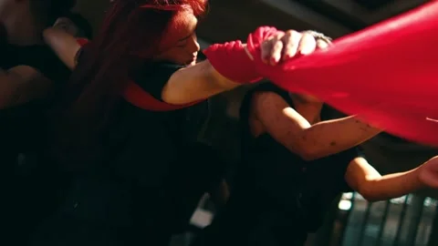 Dancers Interacting with Red Fabric in Close-up Performance Stock Footage 249364954