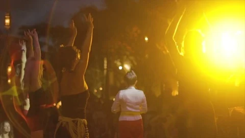 Dancers perform ballet dance moves behind guest speaker. Stock Footage 82329372