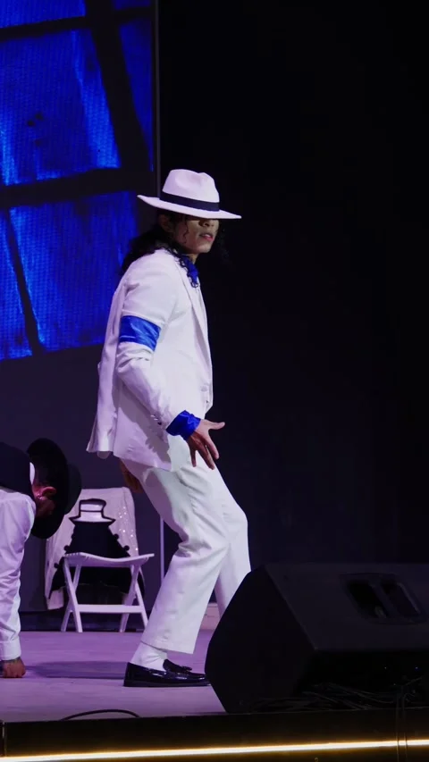 Dancers perform on stage in the style of the legendary Michael Jackson. Stock Footage 333659945