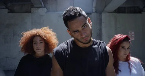 Dancers posing under an overpass Stock Footage 97035339