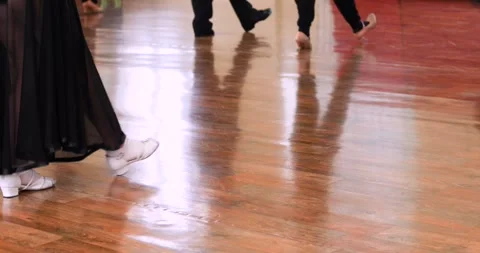 Dancers practicing Standard-style dance moves on the floor Stock Footage 346384258