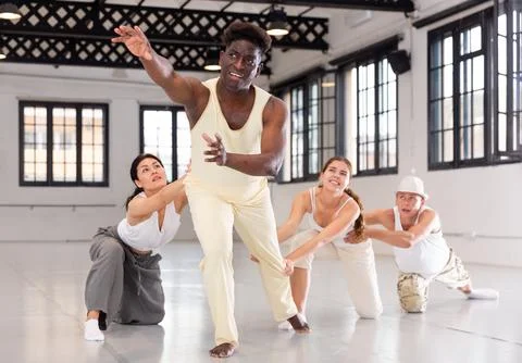 Dancers on stage, choreography with elements of theatrical production Stock Photos
