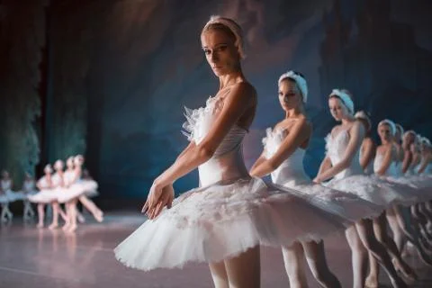 Dancers in white tutu synchronized dancing Stock-Fotos