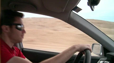 Dancing and driving in the desert Stock Footage 532593