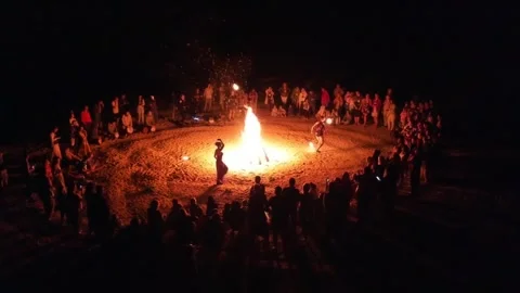 Dancing around the fire (aerial view) part2 库存影片 258836789