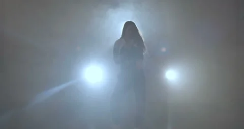 Dancing on the background of spotlights Stock-Footage 106444367