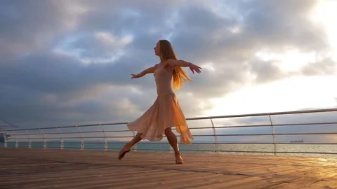 Dancing ballerina in beige silk dress an... | Stock Video | Pond5