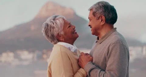Dancing, beach and old couple with hug, marriage and romance with adventure and Stock Footage 265230525