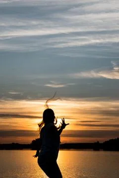 Dancing on a beautigul sunset Stock Photos
