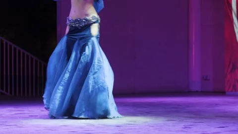 Dancing belly dancer in blue traditional dancer outfit, Turkish belly dancer Stock Footage 234914438