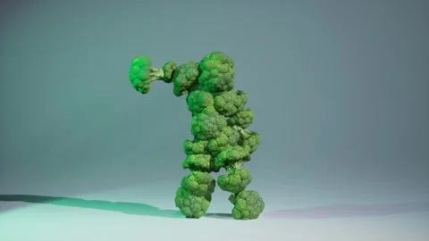 Dancing broccoli man on white background. Moving vegetables in a disco. Stock Footage 283884309