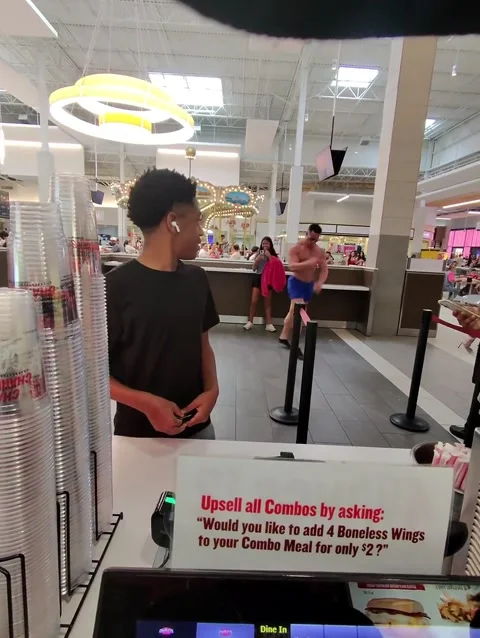 Dancing Buff Guy at Mall Food Court, Katy, Texas, USA - 06 Jun 2026 動画素材 337544485
