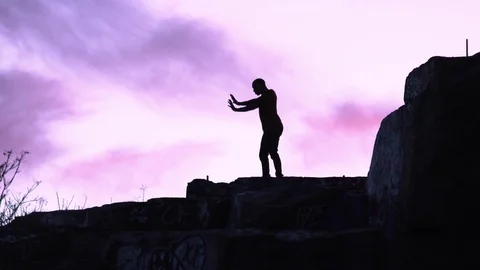 Dancing on Cliff Stock Footage 82705776