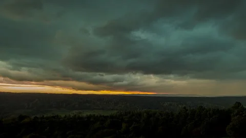 Dancing clouds over the forest TIME LAPS Stock Footage 318072817