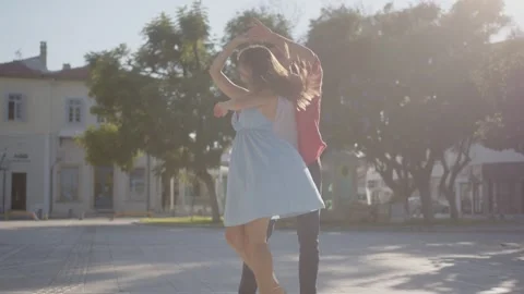 Dancing couple in love doing turns and dips on vacation Stock Footage 281339899