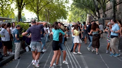 Dancing Couples at Public Paris Summer Festival: Romantic Atmosphere by Stock Footage 249154936