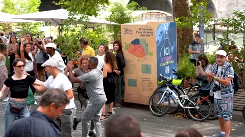 Dancing Couples at Public Paris Summer Festival: Romantic Atmosphere by Stock Footage 249155052