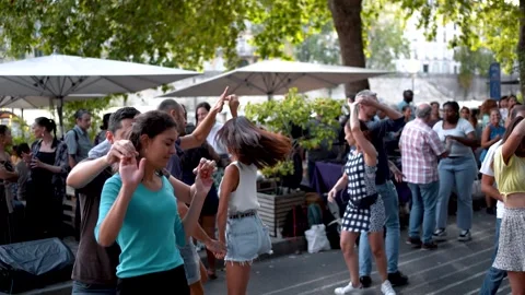 Dancing Couples at Public Paris Summer Festival: Romantic Atmosphere by Stock Footage 249155266