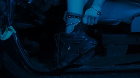 Dancing in a crossover car: Attractive long hair hot blonde girl in blue and Stock-Footage 122501183