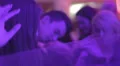 Dancing crowd enjoying party, dj tweaking controls on deck HD Footage