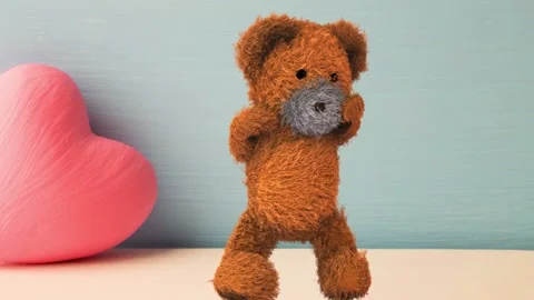 Dancing Cute Teddy Bear Near The Pink Heart Video stock 137846756