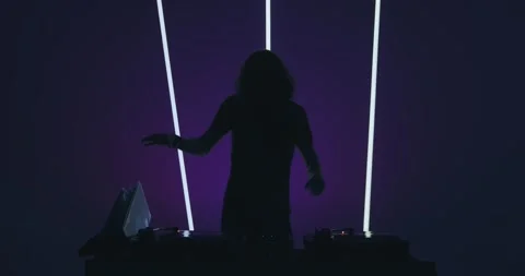 Dancing deejay performing in nightclub playing cool contemporary music at dj Stock Footage 158429028