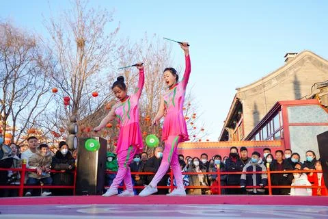 Dancing diabolo acrobatics performance in Hetou Old Street Scenic Area. Stock Photos