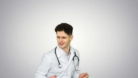 Dancing doctor has some new ideas on gradient background. Stock-Footage 130697185