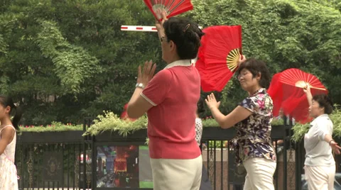 Dancing with fans Stock Footage 37703555