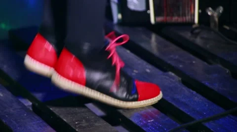 Dancing feet on the box, concert, multi-colored lights Stock Footage 51579163