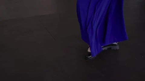 Dancing feet on the dance floor illuminated by spotlights Stock Footage 329093124