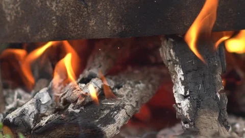 Dancing flames in a real woodburning fire in a woodburning stove Video stock 80297861
