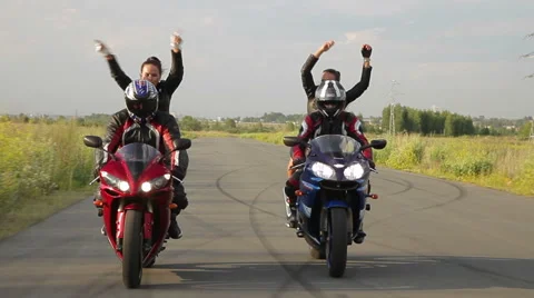 Dancing girl on a motorcycle Stock Footage 42884633